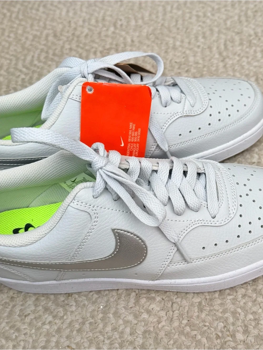 Nike Women’s White Low-Top Sneakers with Neon Green Insole Accent